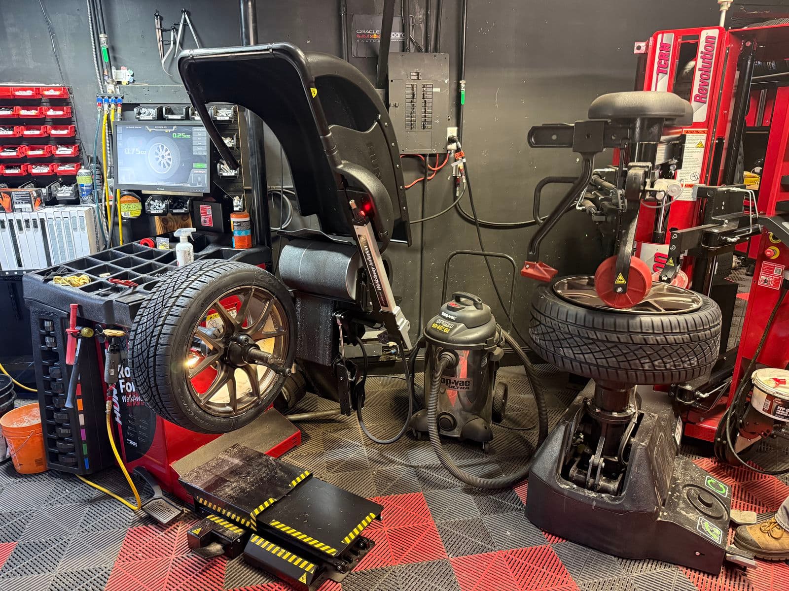 Hunter Road Force WalkAway balancer and Hunter Revolution tire changer on the PitStop & Go shop floor